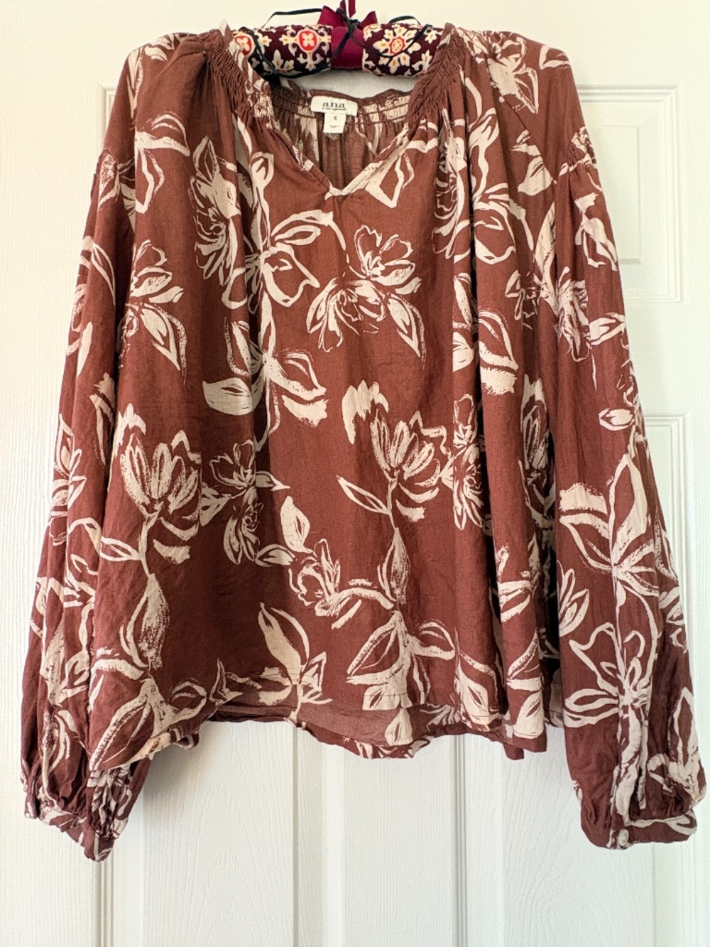 100% Cotton a.n.a. boho long-sleeve floral peasant blouse.